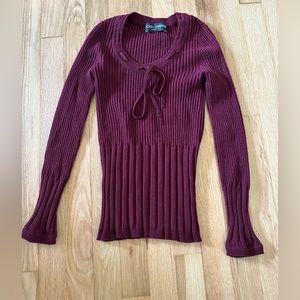 Dolce and Gabbana long sleeve maroon sweater with scoop neck and ribbon details